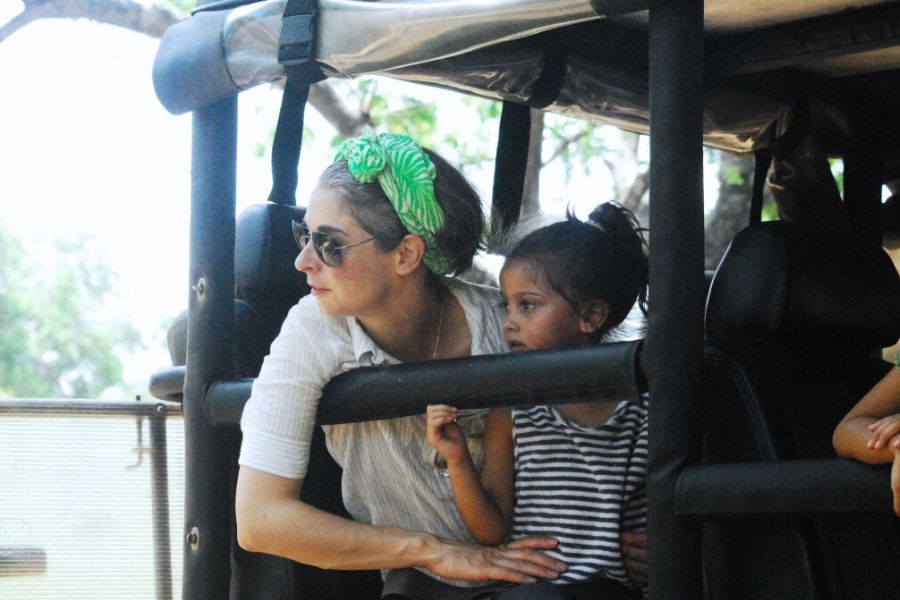 a family experiencing a safari at mahoora tented safari camps yala national park in sri lanka 