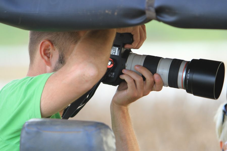 capturing images while their safari at mahoora tented safari camps yala national park in sri lanka