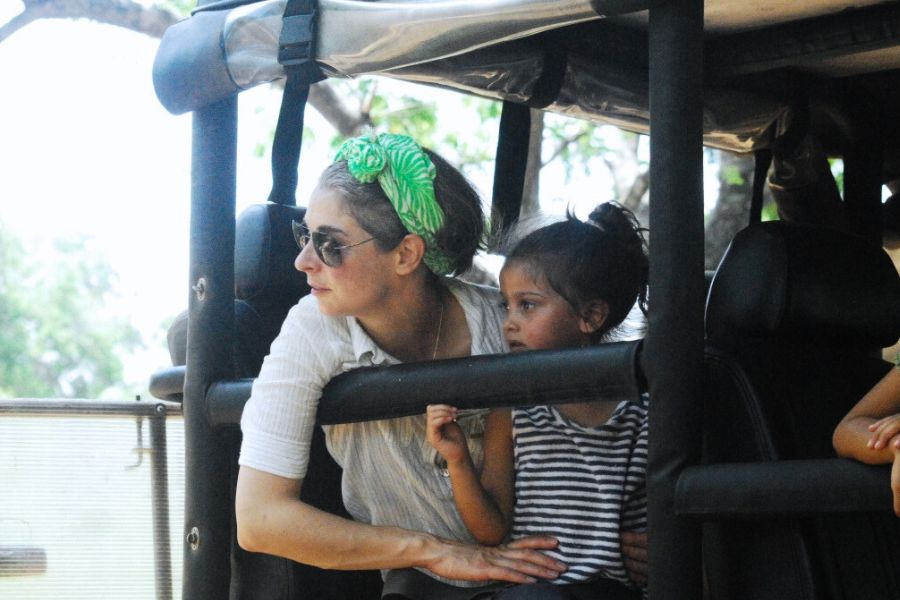 a family experiencing a safari at mahoora tented safari camps yala national park in sri lanka